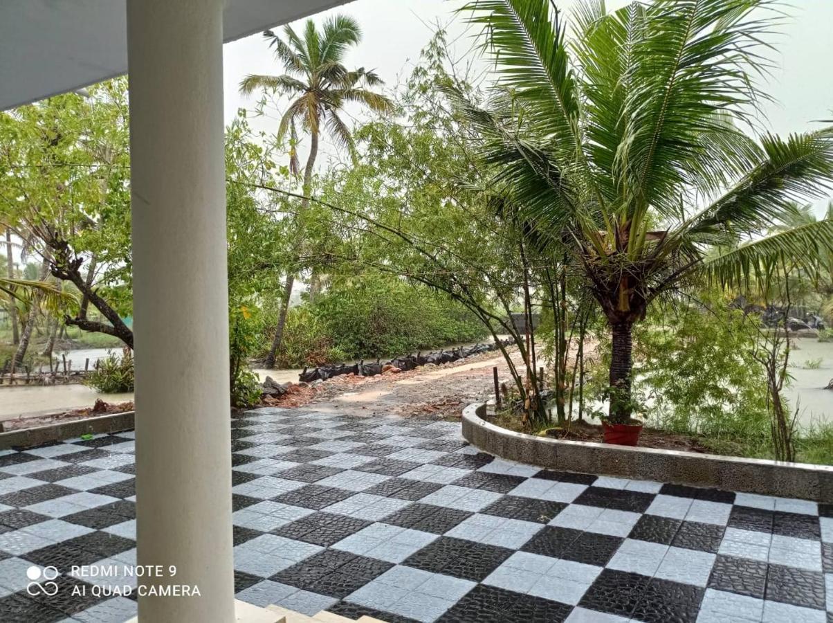 Aqua Green Home Stay Munroe Island Buitenkant foto