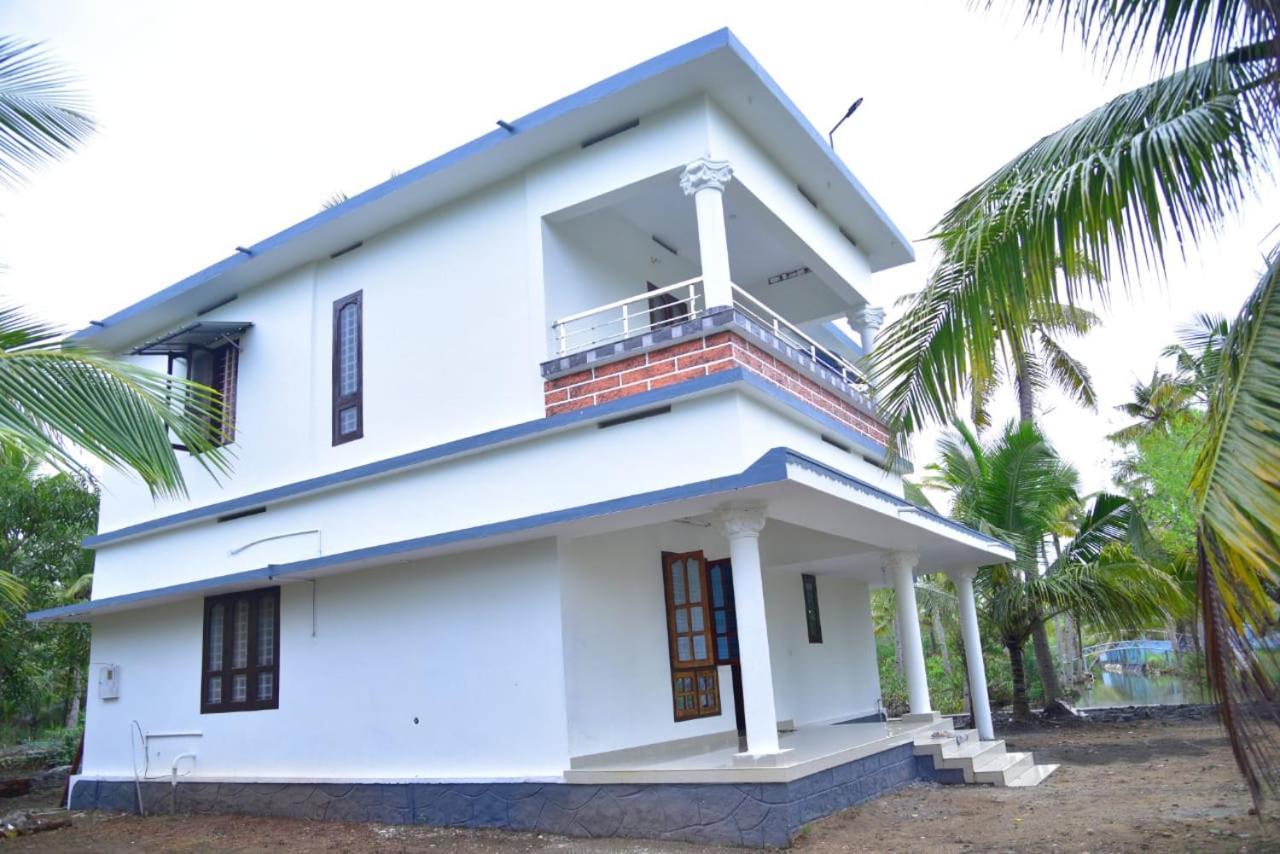 Aqua Green Home Stay Munroe Island Buitenkant foto