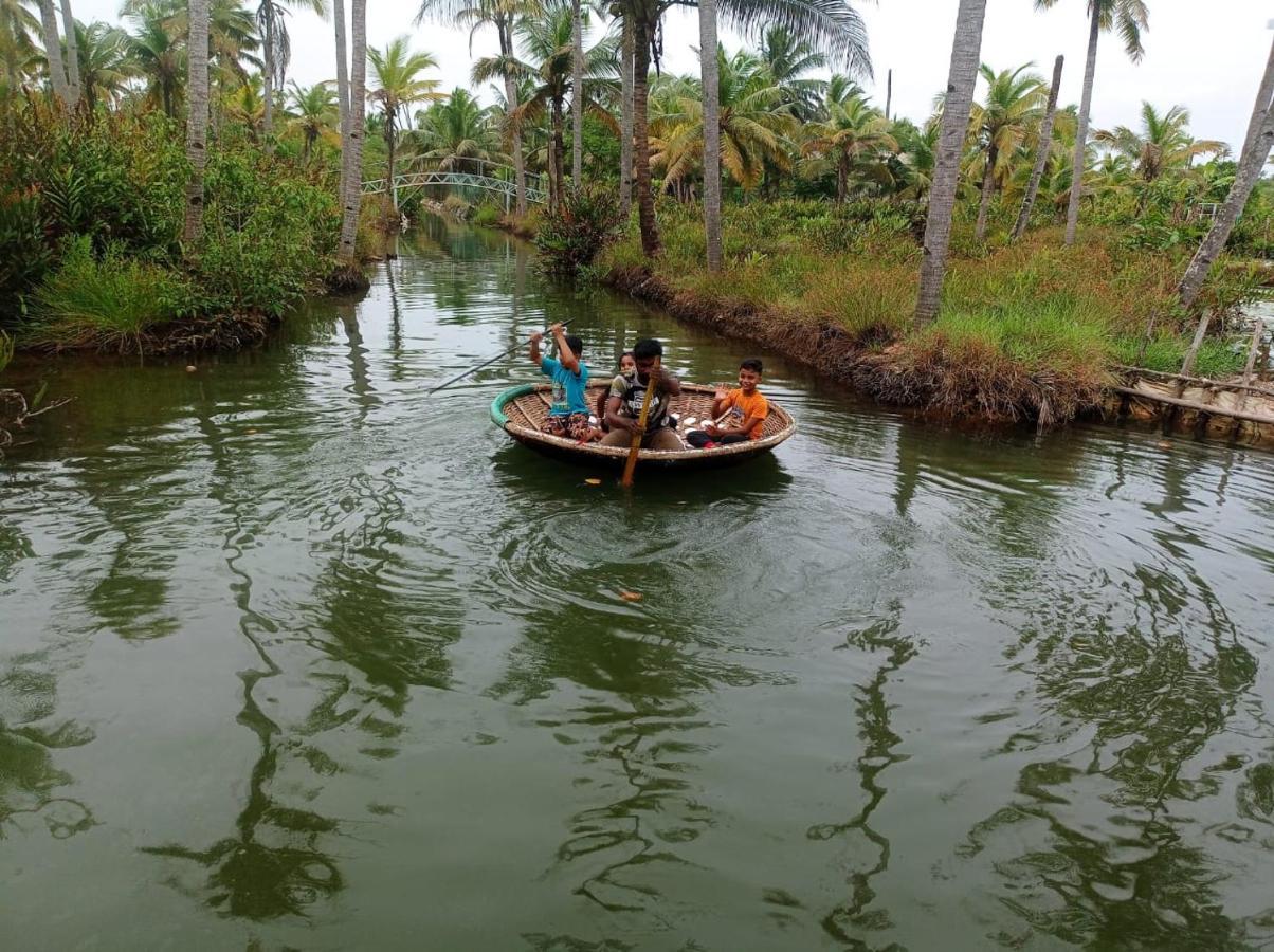 Aqua Green Home Stay Munroe Island Buitenkant foto
